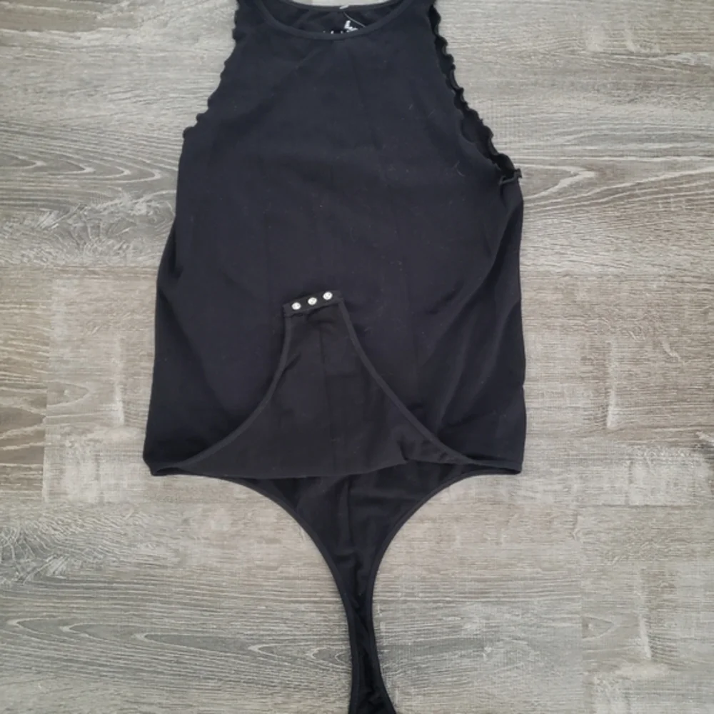 NWT Free People Bodysuit‎